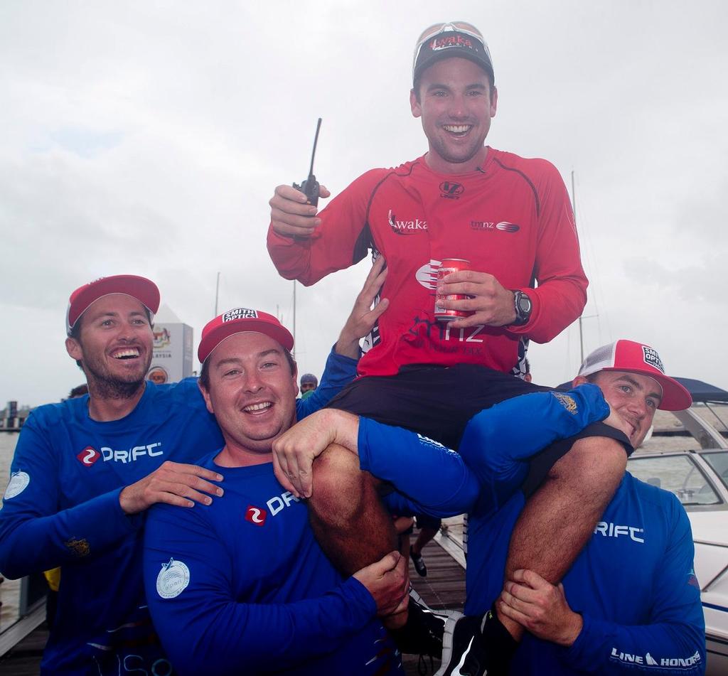 Taylor Canfeld and the crew of USone celebrate winning the Alpari World Match Racing Tour 2013 after Phil Robertson (top) beat Ian Williams, meaning that Taylor won the 2-13 title. ©  OnEdition / WMRT http://wmrt.com/